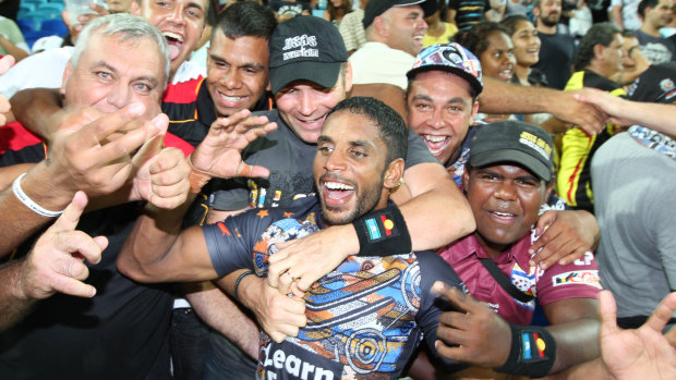 What a night: Campbell is mobbed by fans after the first Indigenous All Stars match in 2010.