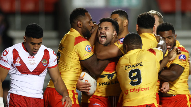 Papua New Guinea players celebrate during their game against Tonga at the World Cup. The rivalry is set to be rekindled in the Pacific Championships.
