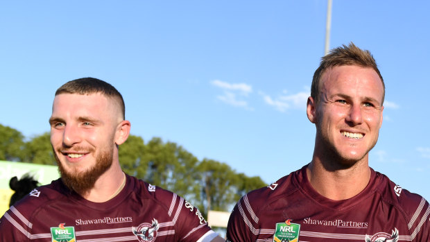 Happier times: Jackson Hastings and Daly Cherry-Evans celebrate at Brookvale.