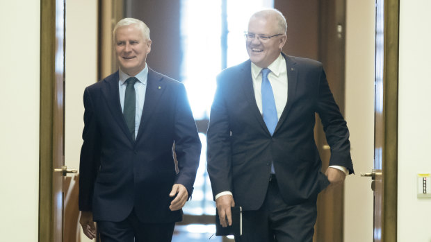 Time to shine ... Deputy Prime Minister Michael McCormack and Prime Minister Scott Morrison arrive to speak with department secretaries around the cabinet table at Parliament House in Canberra on  Thursday. 