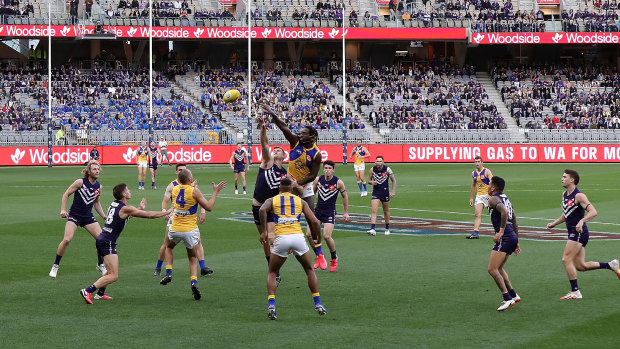 Solid ruck: West Coast's Nic Natanui goes up against Sean Darcy of Fremantle.