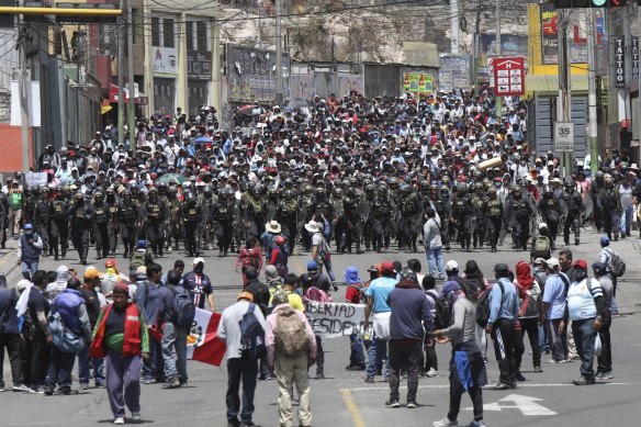 Police arrive where supporters of ousted Peruvian president Pedro Castillo are protesting his detention in Arequipa, Peru.