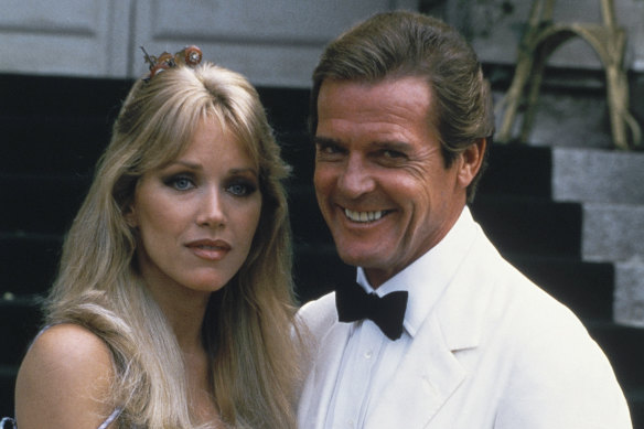 Actor Roger Moore, right, poses with his co-star Tanya Roberts from the James Bond film A View to a Kill.