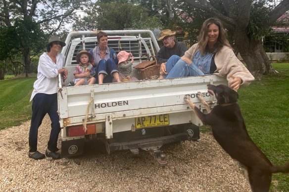 Heading out for a picnic on the farm – “the heart of our family”, says Ward’s eldest daughter Rosie, at far right with her kelpie, Alby. 