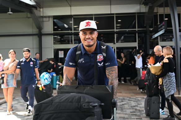 Roosters prop Spencer Leniu put on a brave face as he returned to Sydney on Tuesday.