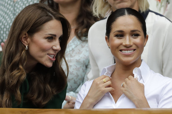 Meghan, Duchess of Sussex, and Catherine, Duchess of Cambridge, at Wimbledon in 2019.