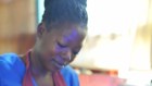 A nurse tends to a baby at Kiwoko Hospital in Central Uganda, which has already been affected by cuts to US aid. 