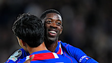 Dembele celebrates opening the scoring against Slovan Bratislava