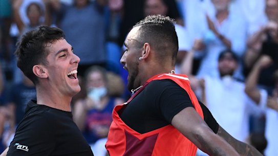 Thanasi Kokkinakis and Nick Kyrgios celebrate victory on Tuesday.