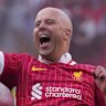 Liverpool’s manager Arne Slot celebrates after winning the EPL title.