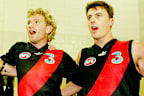 Andrew Welsh, James Hird and Matthew Lloyd in their playing days at Essendon in 2004.