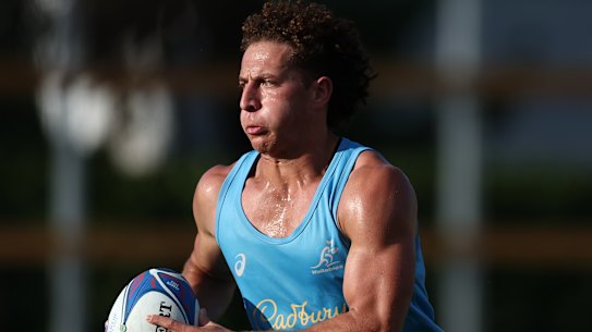 Mark Nawaqanitawase runs the ball during a Wallabies training session ahead of the Rugby World Cup.