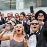 It's not all about the racing: Elle Macpherson admires 'beautiful people' at Derby Day