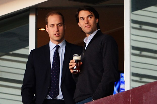 Prince William with close friend William van Cutsem at an Aston Villa football match on November 30, 2013, in Birmingham, England. (Photo by Michael Regan/Getty Images)