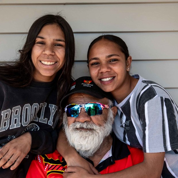 Wilcannia elder William Murray, a signatory to the Uluru Statement from the Heart, with his granddaughters Kyanna (left) and Temmiah (right). 
