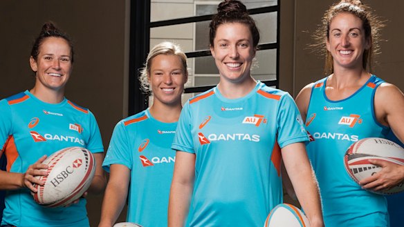 Bombshell: Emilee Cherry, front, is expecting a baby. 