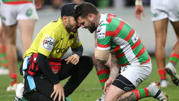 Painful: Adam Reynolds after injuring his shoulder against the Storm.