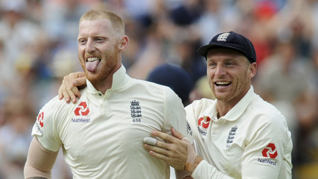 Happier times: Stokes and teammate Jos Buttler in the recent Test against India.