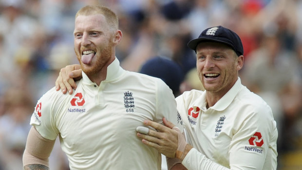 Happier times: Stokes and teammate Jos Buttler in the recent Test against India.