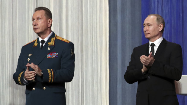 Russian President Vladimir Putin, right,with National Guard chief Viktor Zolotov last year.