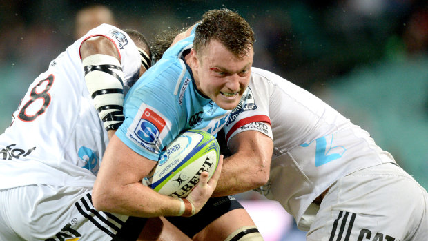 Jack Dempsey hits the Crusaders line hard in an encouraging win for the Waratahs.