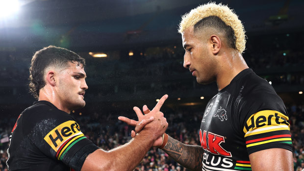 Viliame Kikau and Nathan Cleary celebrate Penrith’s preliminary final win.