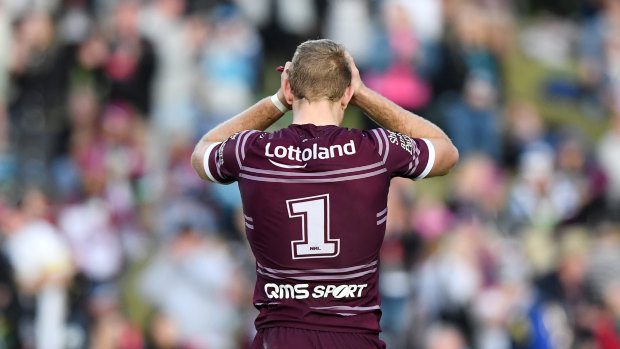 Oh, the pain: Tom Trbojevic cuts a disconsolate figure after Manly blew a big lead against Penrith.