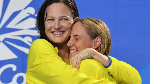 Not so bad when your sister wins: Silver medallist Cate Campbell (left) hugs gold medallist Bronte Campbell  after the 100m freestyle.