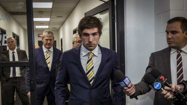Andrew Gaff leaves the tribunal.