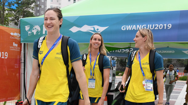 Cate Campbell (left) on her way to training in Gwangju.