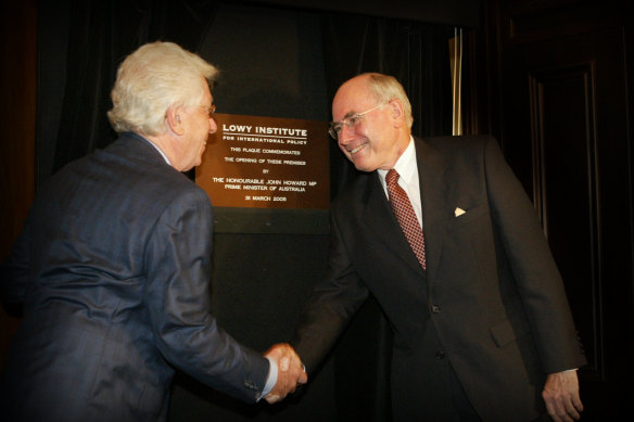 Frank Lowy with then prime minister John Howard at the official opening of the Lowy Institute in 2005. 