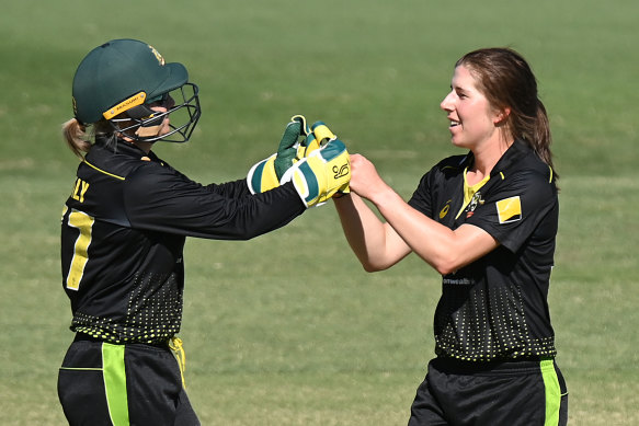 Healy and Georgia Wareham celebrate the wicket of Lauren Down.