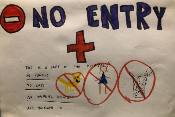 The sign on the front of Lisa Hounsley’s “laundry hospital” at home.