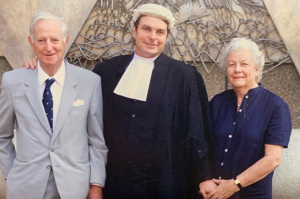 McBride with his parents in 2004 after passing the bar exam.