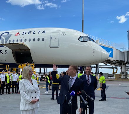 Melbourne CEO Lorie Argus, Delta Airlines Asia-Pacific chief Jeff Moomaw and Victorian Industry Minister Colin Brooks (right) after Delta landed its first flight from Los Angeles to Melbourne on December 6.