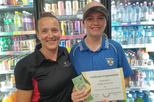 Casino Mini Mart owner Erin Witton gave 14-year-old Izzy Miller $100 for her bravery.