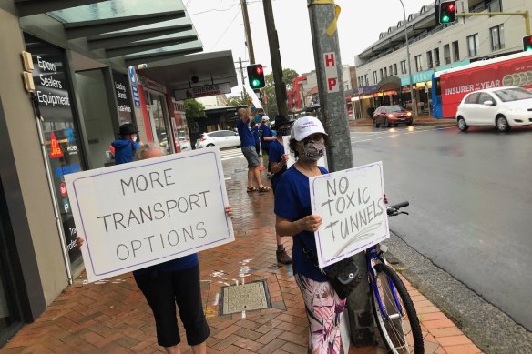 Larissa Penn’s supporters campaign outside Gladys Berejiklian’s office.