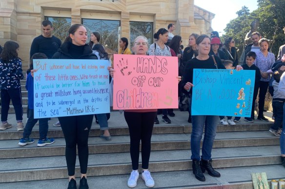 Protesters outside St Patrick’s Catheral on April 25 voiced their support for Mark Latham’s anti-trans education bill.