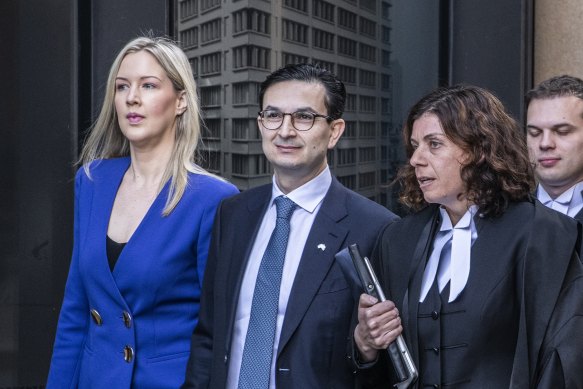 Munjed Al Muderis with his partner Claudia Roberts, left, and barrister Sue Chrysanthou, SC, outside the Federal Court in Sydney on September 4.
