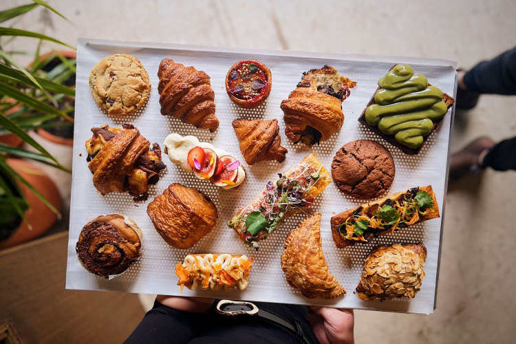 Pastries including pandan kaya croissant toast and mushroom rendang hand pie.