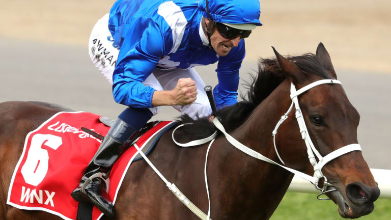 History: Jockey Hugh Bowman celebrates winning the a fourth Cox Plate aboard Winx.