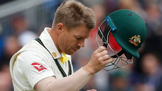 Warner leaves the field after being dismissed in Manchester.