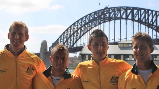 Tomic and Hewitt in happier times during a Davis Cup draw in 2011. 