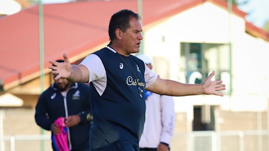 Dave Rennie talks to his players during training at the team’s base in France ahead of a clash against Scotland.