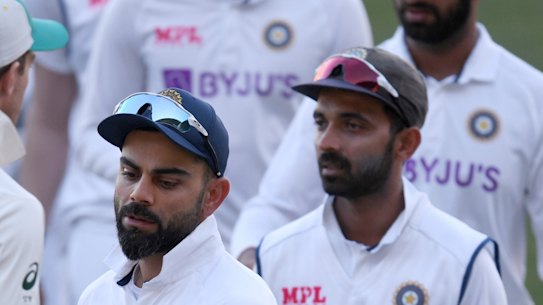 Virat Kohli, centre, and his teammates are coming to terms with an eight-wicket defeat inside three days. 