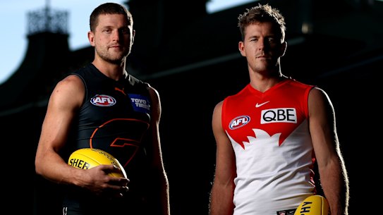 Respect ... Jacob Hopper of the Giants and Luke Parker of the Swans at the SCG on Tuesday.