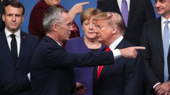 NATO Secretary General Jens Stoltenberg speaks with then-US President Donald Trump in 2019.