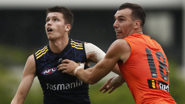 Ned Reeves (left) and Jonathon Ceglar contest the ruck during a Hawks’ intra-club match. 