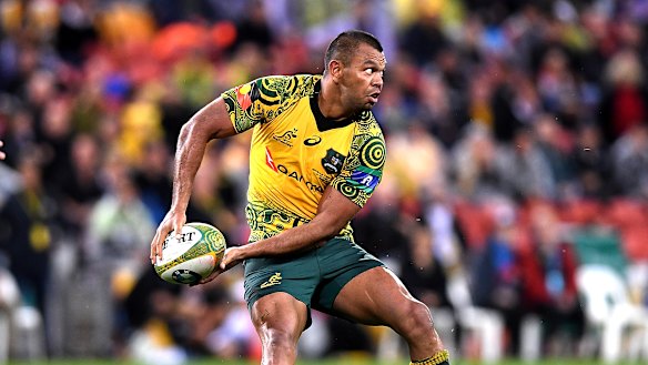 Kurtley Beale passes the ball during the Bledisloe Cup match between the Wallabies and the All Blacks at Suncorp Stadium in 2017. 