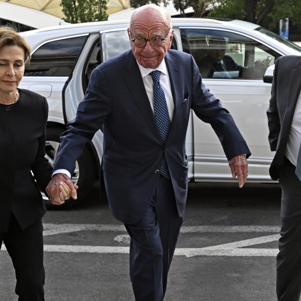 Rupert Murdoch and his wife, Elena Zhukova Murdoch, arrive at the Second Judicial District Court in Reno.